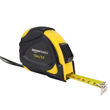 Carica l'immagine nel visualizzatore di Gallery, Amazon Basics metro per misurazione, autobloccante, 10 m, con scala metrica decimale (scala di precisione MID), Nero, Gi