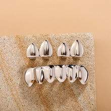 Carica l'immagine nel visualizzatore di Gallery, Set di grillz unisex Bling per denti HipHop, lucido, in lega, per sopra e sotto, coperti di fascino alla moda
